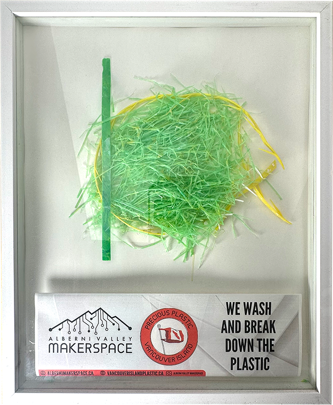 Step two of Recycling Broken down plastic pieces ready for melt